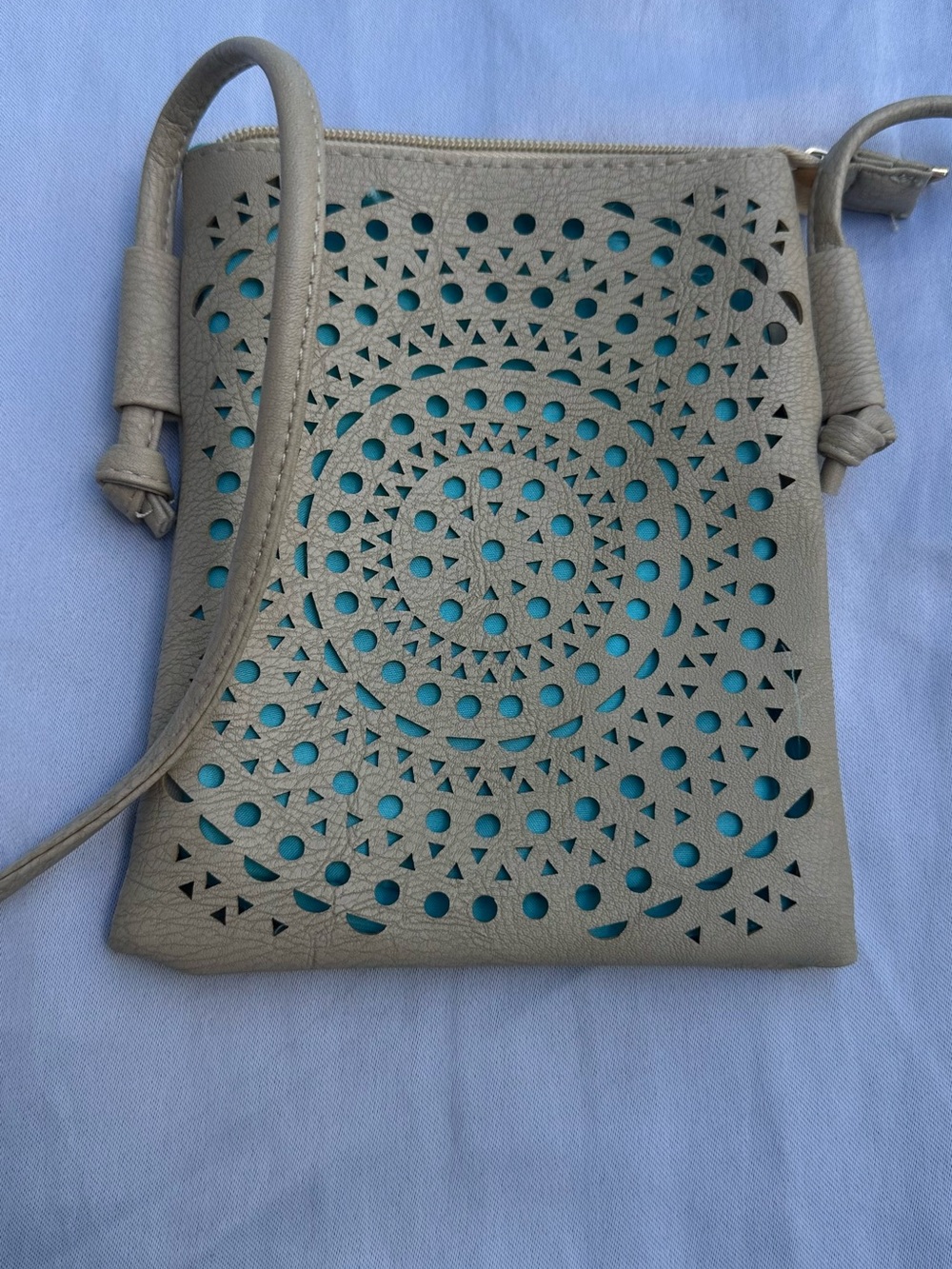 One A Beige Laser-Cut Crossbody with Teal Accent